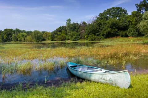 Canoe on the pond Stock Photos