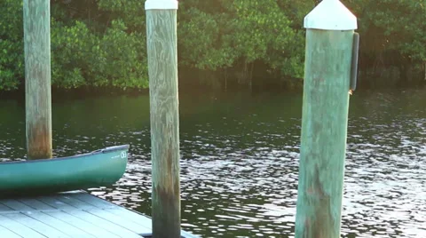 Canoe ready to launch by the dock Stock Footage 32186365