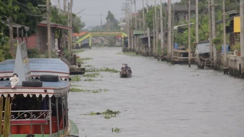 Canoe rowing down river canal Stock Footage 77770329