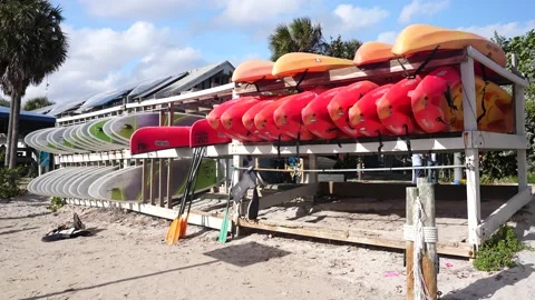 Canoe Stack Storage Different Color On The River Beach Stock-Footage 158345927