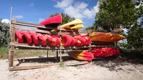 Canoe Stack Storage Different Color On The River Beach Stock-Footage 158345929
