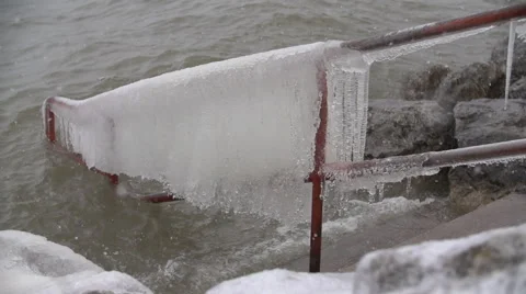 CanoeDock Ice GeorgianBay Winter Waves SuperSlowMotion 240FPS 1080HD Stock Footage 62833949