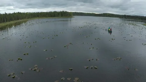 Canoeing an Alaska lake 2 Stock Footage