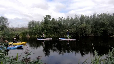 Canoeing and Paddleboarding Stock Footage 138326093