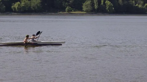Canoeing children. Lake Valea Morilor in Chisinau, Republic of Moldova. Stock Footage