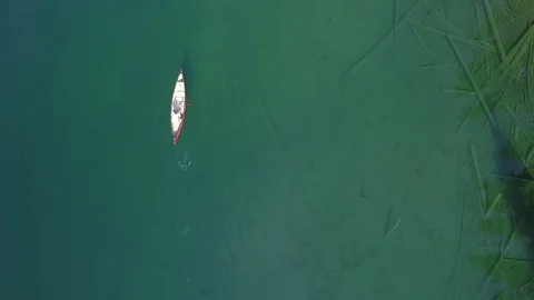 Canoeing in crystal water Stock Footage