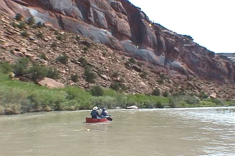 Canoeing Down River Canyon Stock Footage 93032164