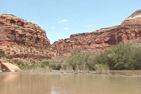 Canoeing Down River Canyon Stock Footage 93517176