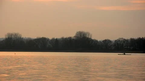 Canoeing of a lake Vídeos de archivo 10887135