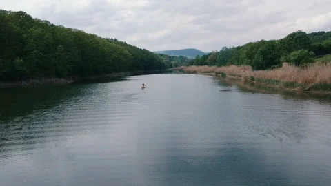Canoeing on lake Stock Footage 107623538