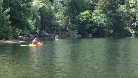 Canoeing on lake Stock Footage 158061072