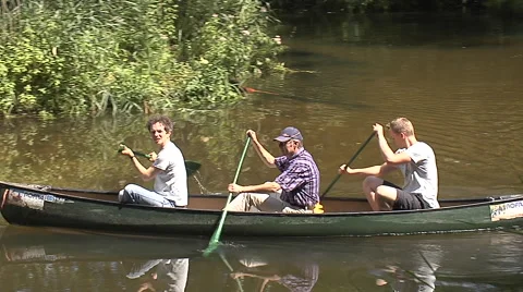 Canoeing men three men generations Stock Footage 49118938