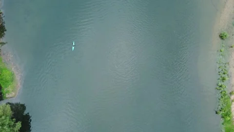 Canoeing on a river from a drone view Stock Footage 239225841