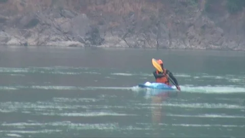 Canoeing on the river Stock Footage 72330187