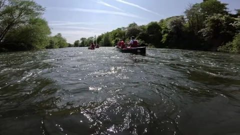 Canoeing on the River Wye.  Stock Footage 247973038