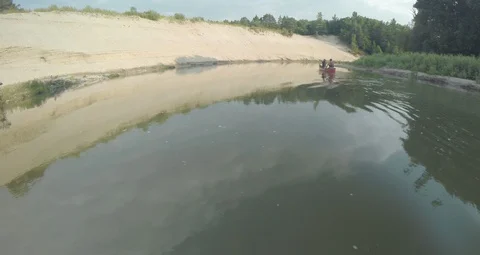 Canoeing through a River  Stockbeeldmateriaal 90544948