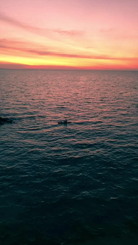 Canoeing under the sunset. Stock Footage 231134904