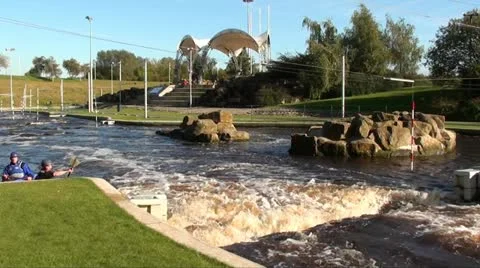 Canoeing on whitewater course Stock Footage 20646010