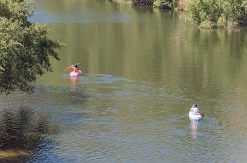 Canoeists in Amazonia River Stock Photos