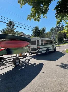Canoes being returned from drop off point Stock Photos