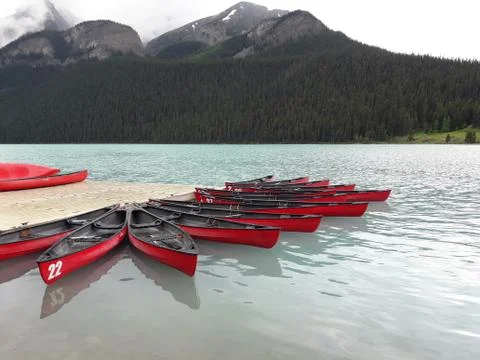 Canoes at the dock. Stock Photos