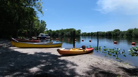 Canoes by the Lake Stock Footage 108876548