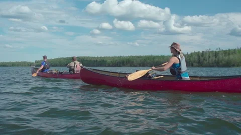 Canoes on a lake in summer 스톡 동영상 88301101