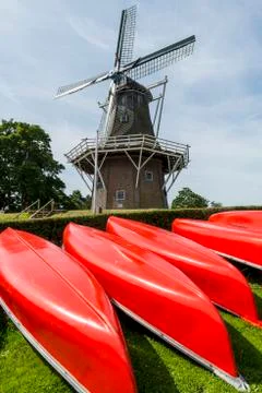 Canoes with mill Stock Photos