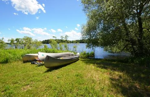 Canoes ready to launch Stock Photos