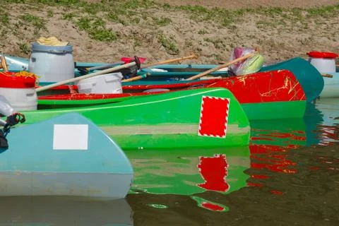 Canoes on the Riverside Stock Photos