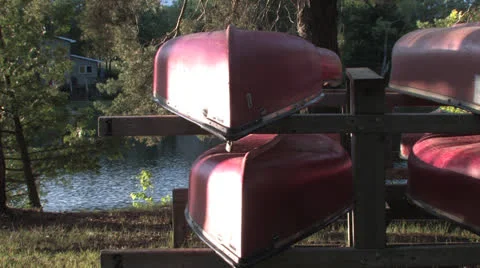 Canoes at Sunset Stock Footage 25394810