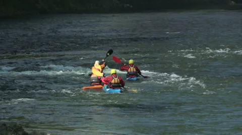 Canoes training on the rushing river Stock Footage 32595118