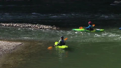 Canoes training on the rushing river Stock Footage 32595124