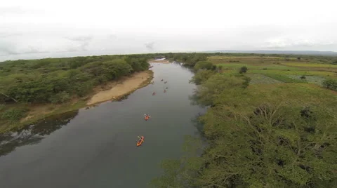 Canoing on a river in Africa Stock Footage 60917429