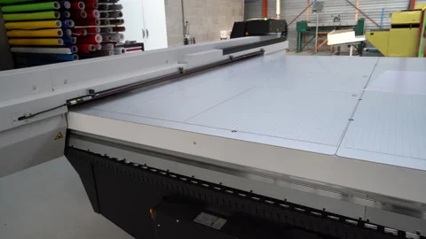 Canon Arizona UV flatbed printer - tilt up shot showing the side and top Stock Footage 221495201