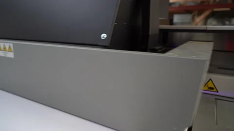 Canon Arizona UV Flatbed Printer printing a calibration page Stock Footage 224934911