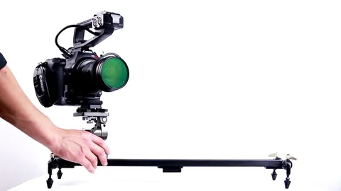 Canon C100 Camera Slider - Studio Vídeo Stock 77433126