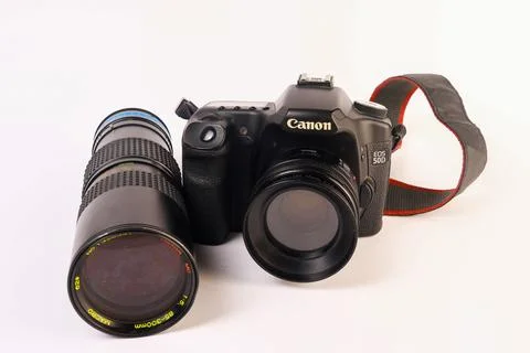 Canon EOS 50d camera body paired with a detached telephoto zoom lens Stock Photos