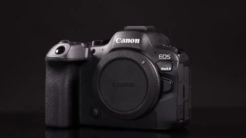 Canon EOS R6 mark II camera, body on black background. Stock Footage 293282997