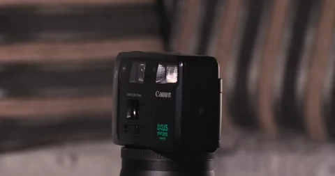 Canon IXUS FF25 date Turntable battery Disposal Old Technology 25mm build Stock Footage 244654820