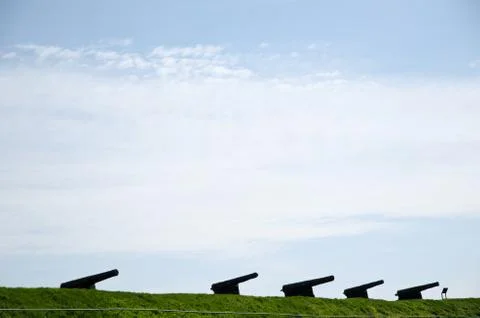 Canons in a row Stock Photos