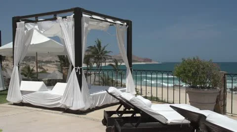 Canopy bed at the ocean side in Los Cabos Video stock 11672932