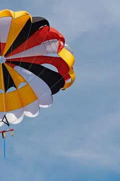 Canopy of a multicolor parachute in air. Foto stock