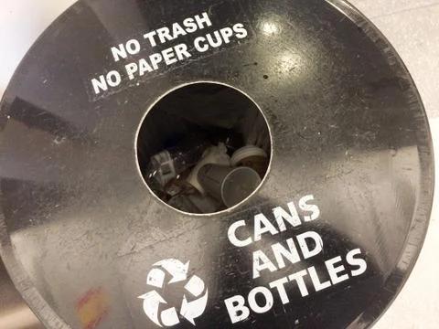 Cans and bottles recycle bin Stock Photos