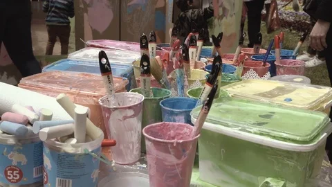 Cans and containers with multi-colored paint Stock Footage 91585829