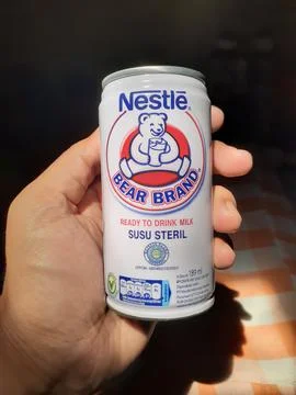 Cans of bear milk Fotos de archivo