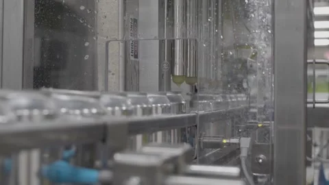 Cans Being Filled Stock Footage 244754084