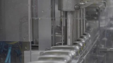 Cans Being Filled Stock Footage 244758552