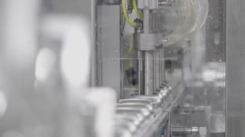 Cans Being Filled Stock Footage 244758765