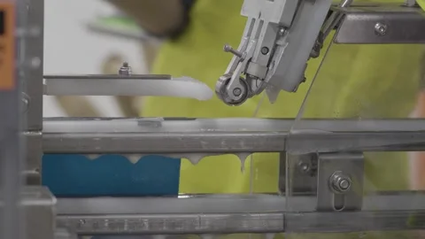 Cans Being Topped Stock Footage 244683544